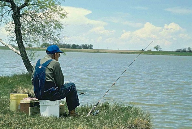 Old_man_fishing Pedro Ramirez_ US Fish and Wildlife Service Public Domain